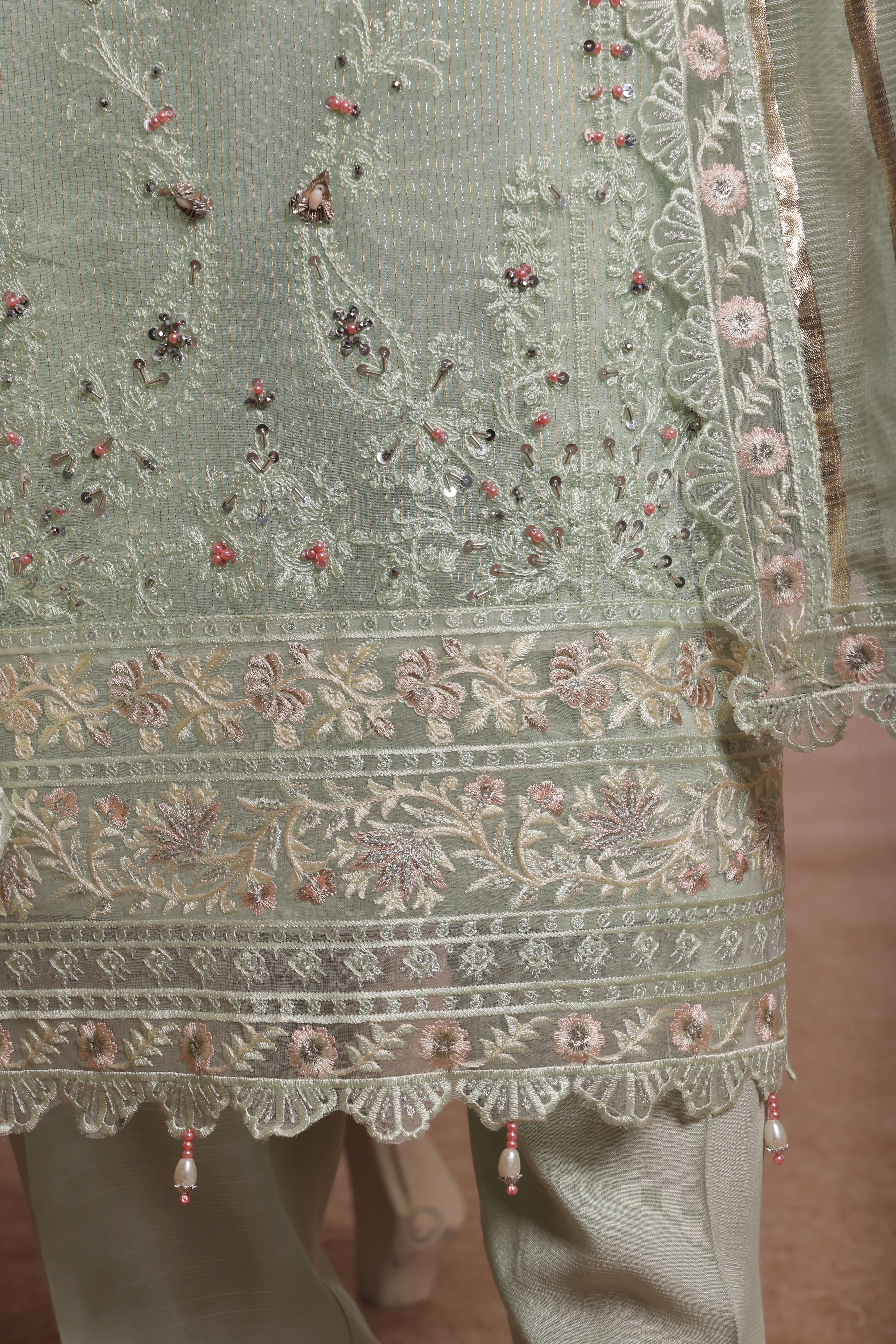 Dressline Red-Rose A Statement Of Elegance Semi Stitched Zari Aiyudiya Net Collection With Staple Lorex Dhari Dupatta & Raw Silk Grip Trousers
