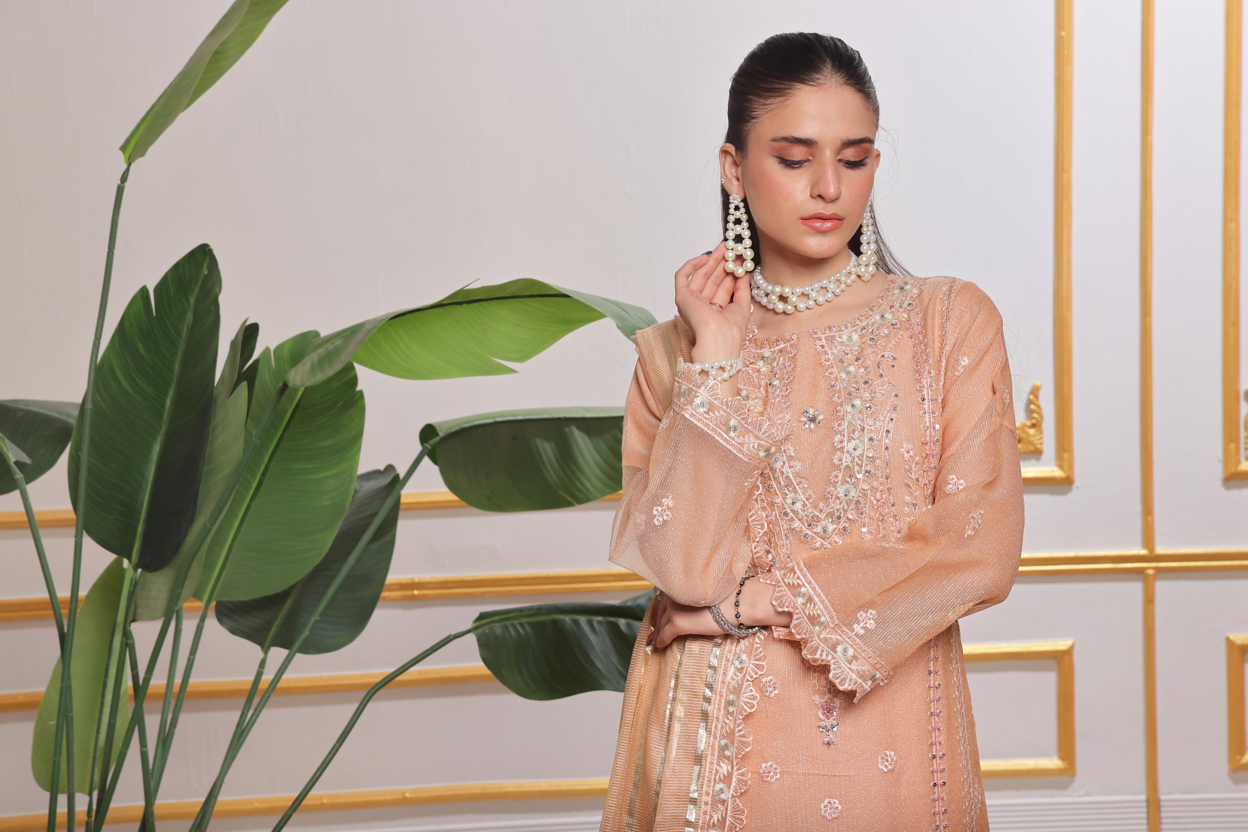 Dressline Red-Rose A Statement Of Elegance Semi Stitched Zari Aiyudiya Net Collection With Staple Lorex Dhari Dupatta & Raw Silk Grip Trousers