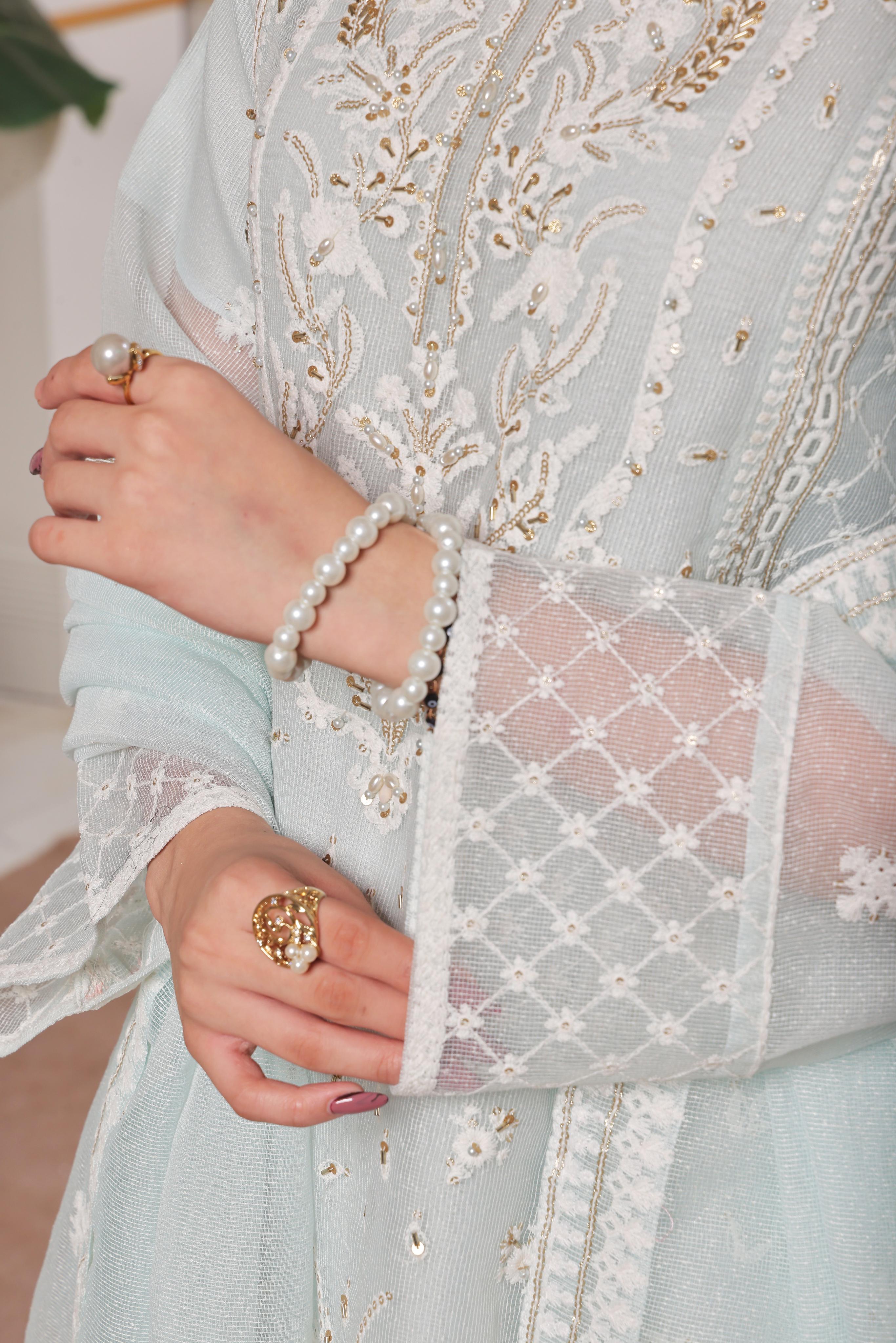 Dressline Lotus Refined Grace In Net Viscose Semi Stitched Aiyudiya Net Viscose Suit With Raw Silk Grip Trousers