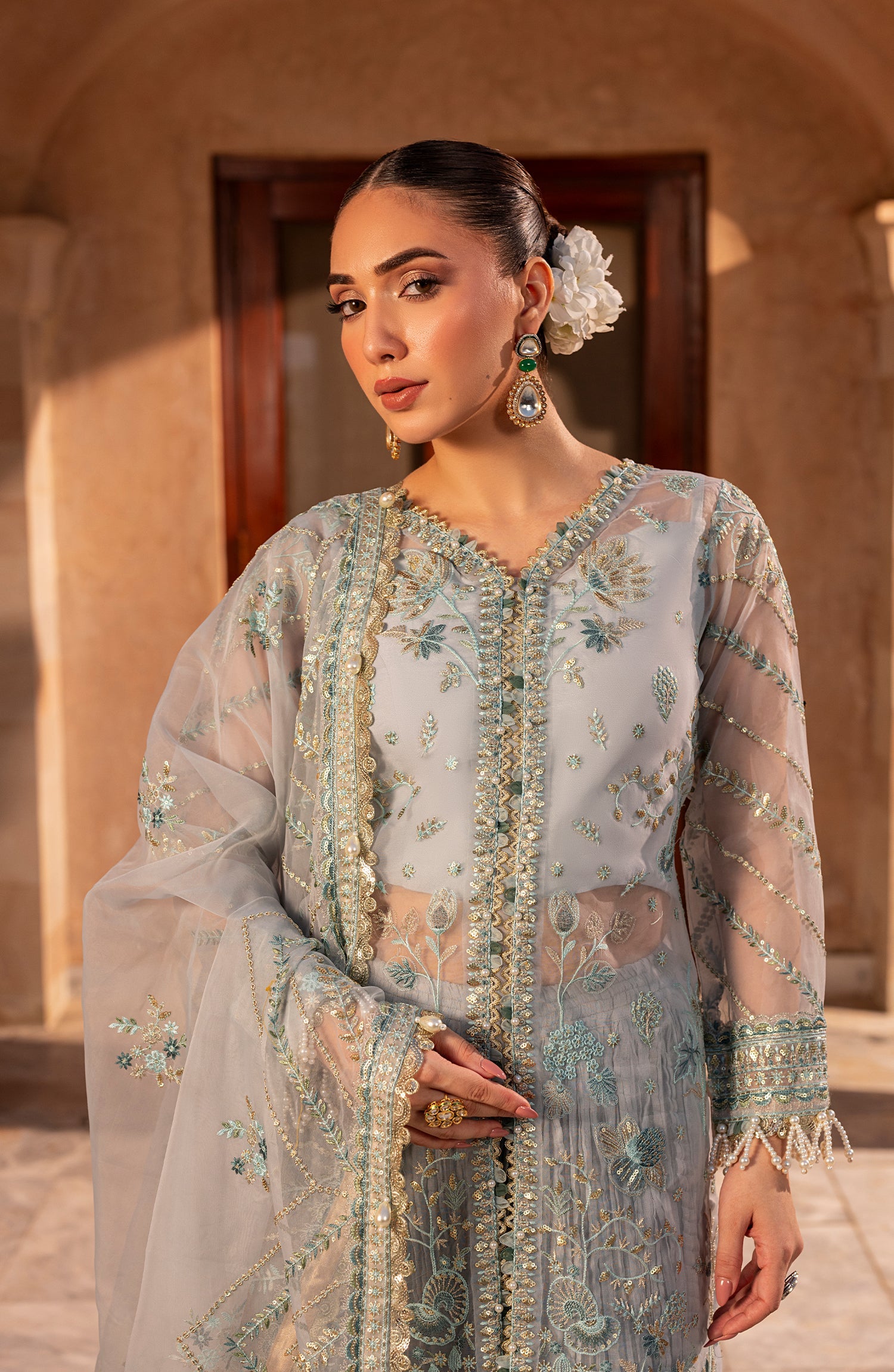 Side pose of model showcasing Aylin Aqua formal dress for party wear