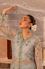 Close-up of model highlighting fabric details of Aylin Aqua formal dress
