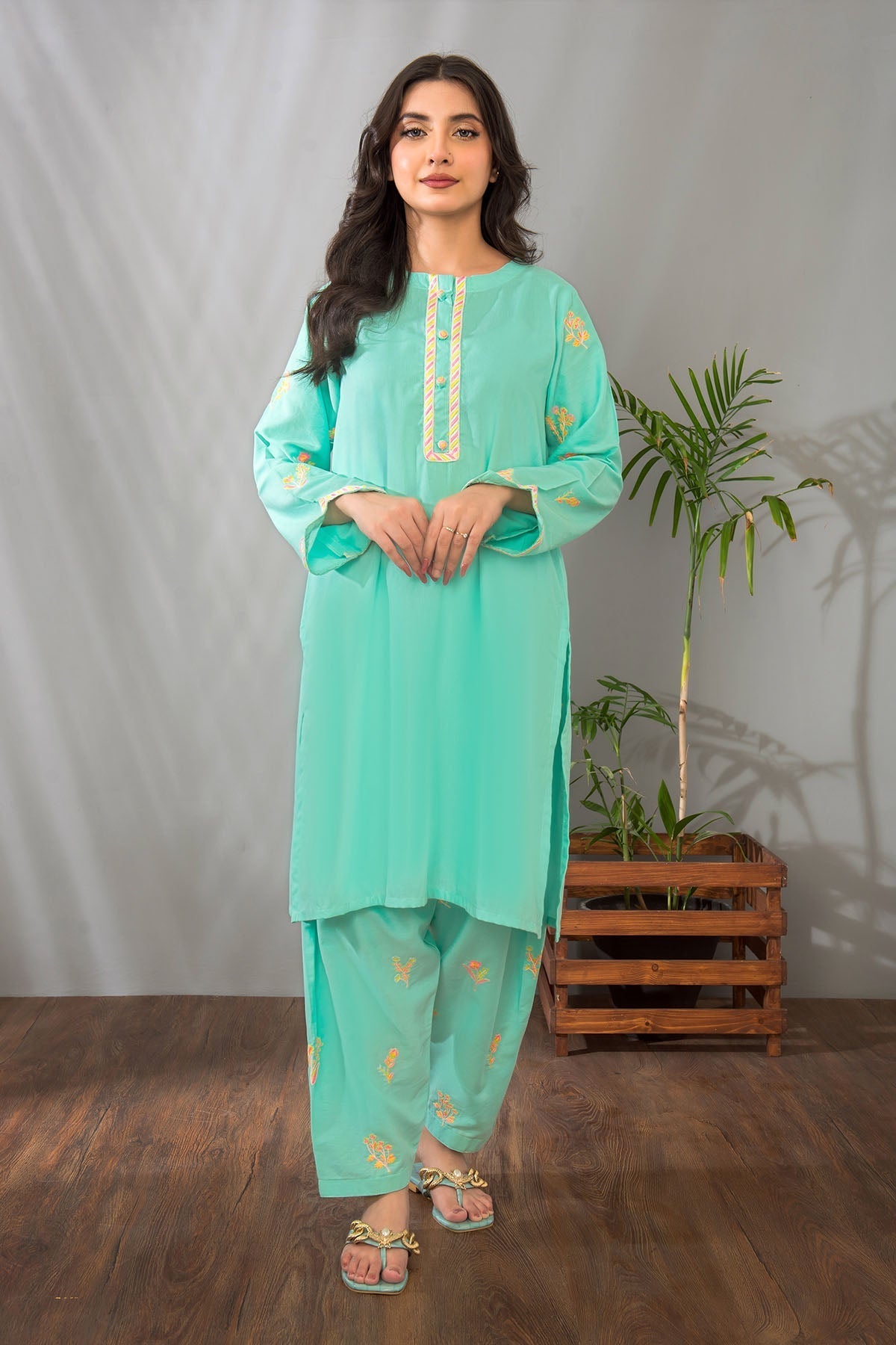 Cotton Embroidered 2 Pc Suit with detailed embroidery designs, offering a stylish and comfortable look for both casual and festive occasions.