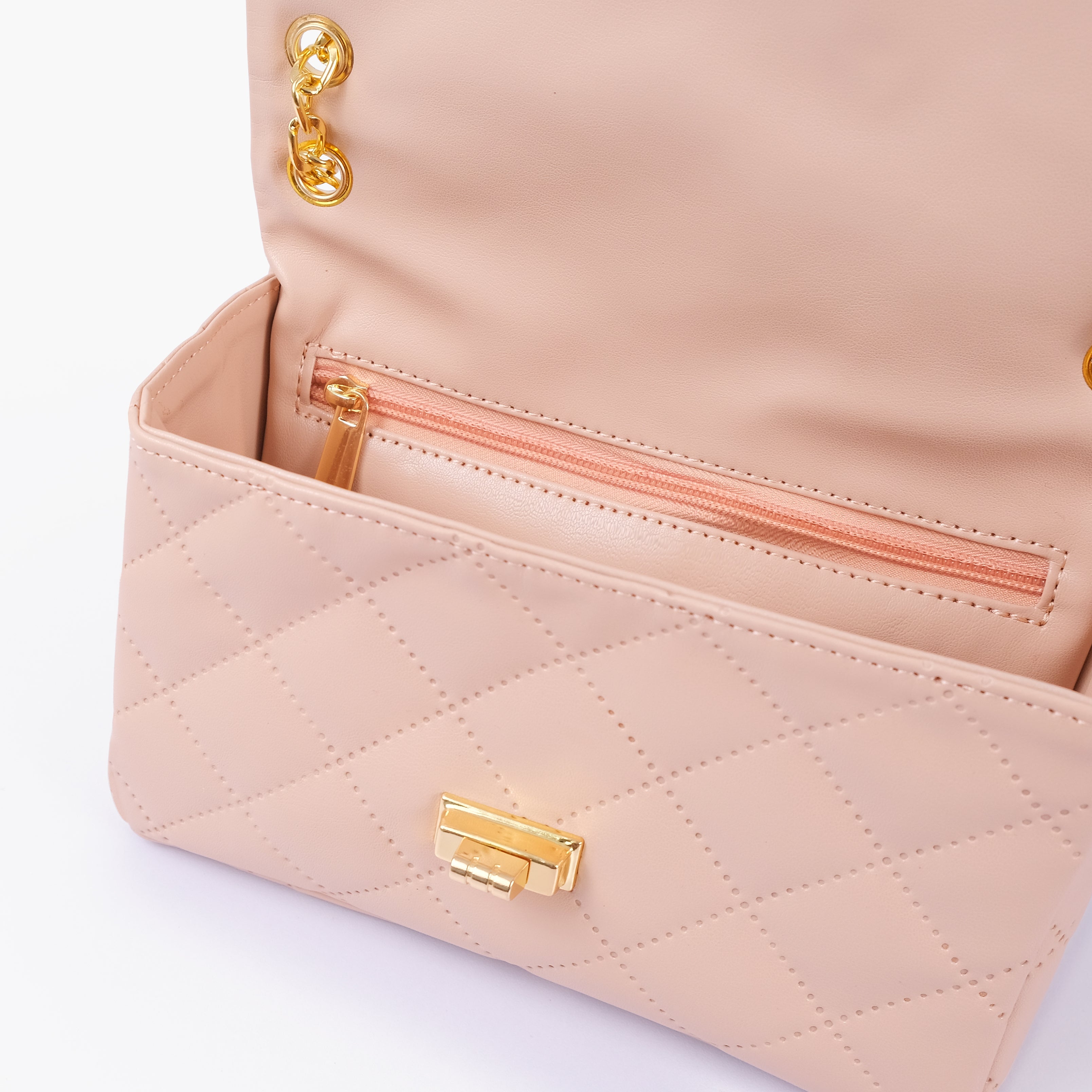 RTW Creation - Baby pink quilted mini bag with chain