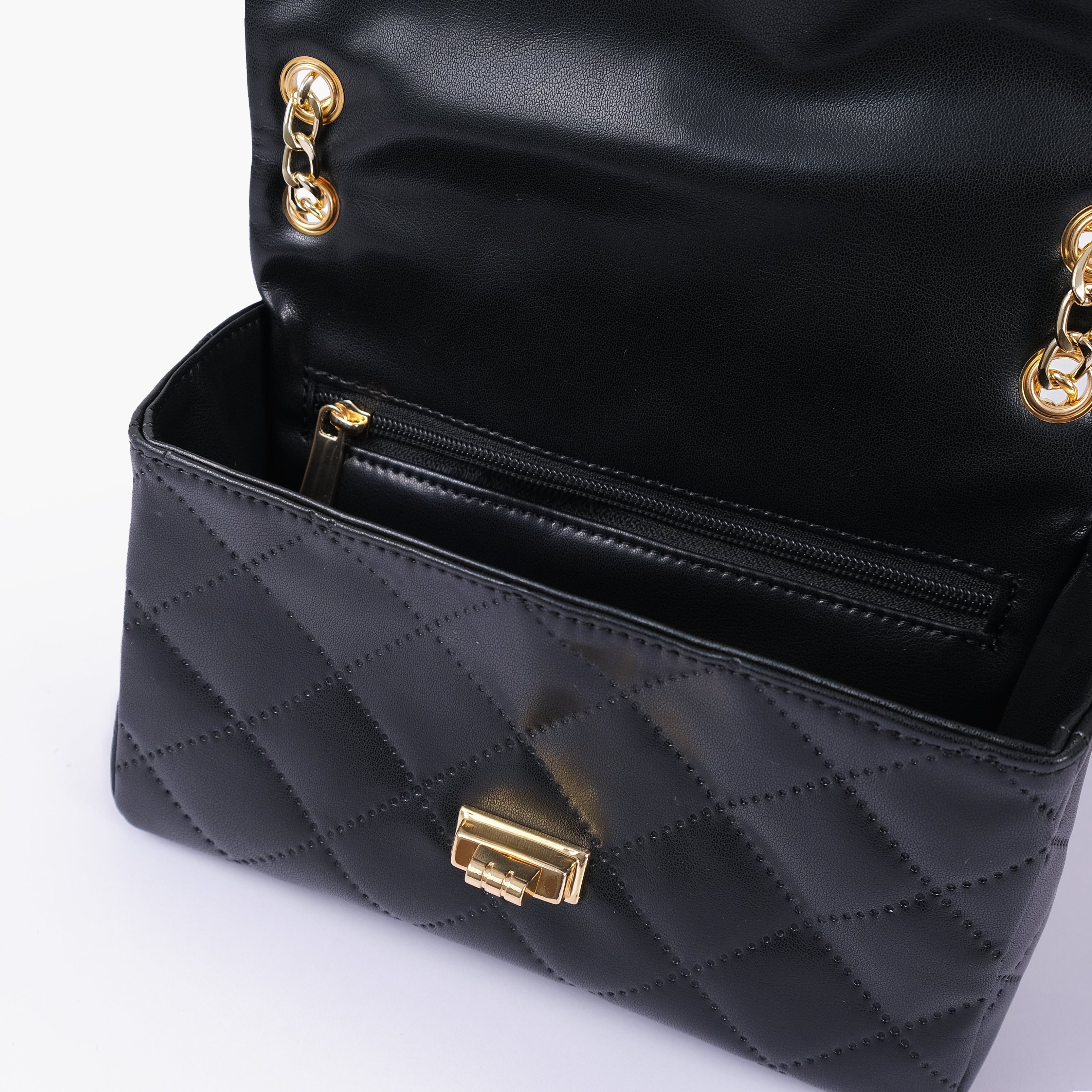RTW Creation - Black quilted mini bag with chain