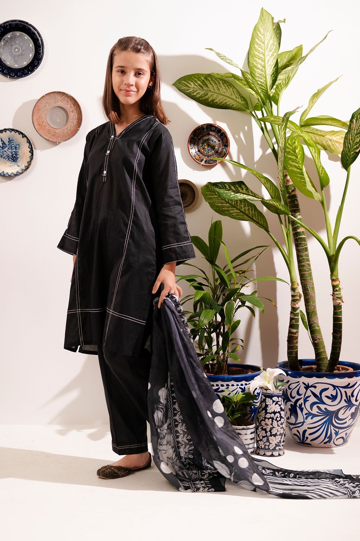 Classic black cotton suit for girls â?? simple, elegant & timeless. 