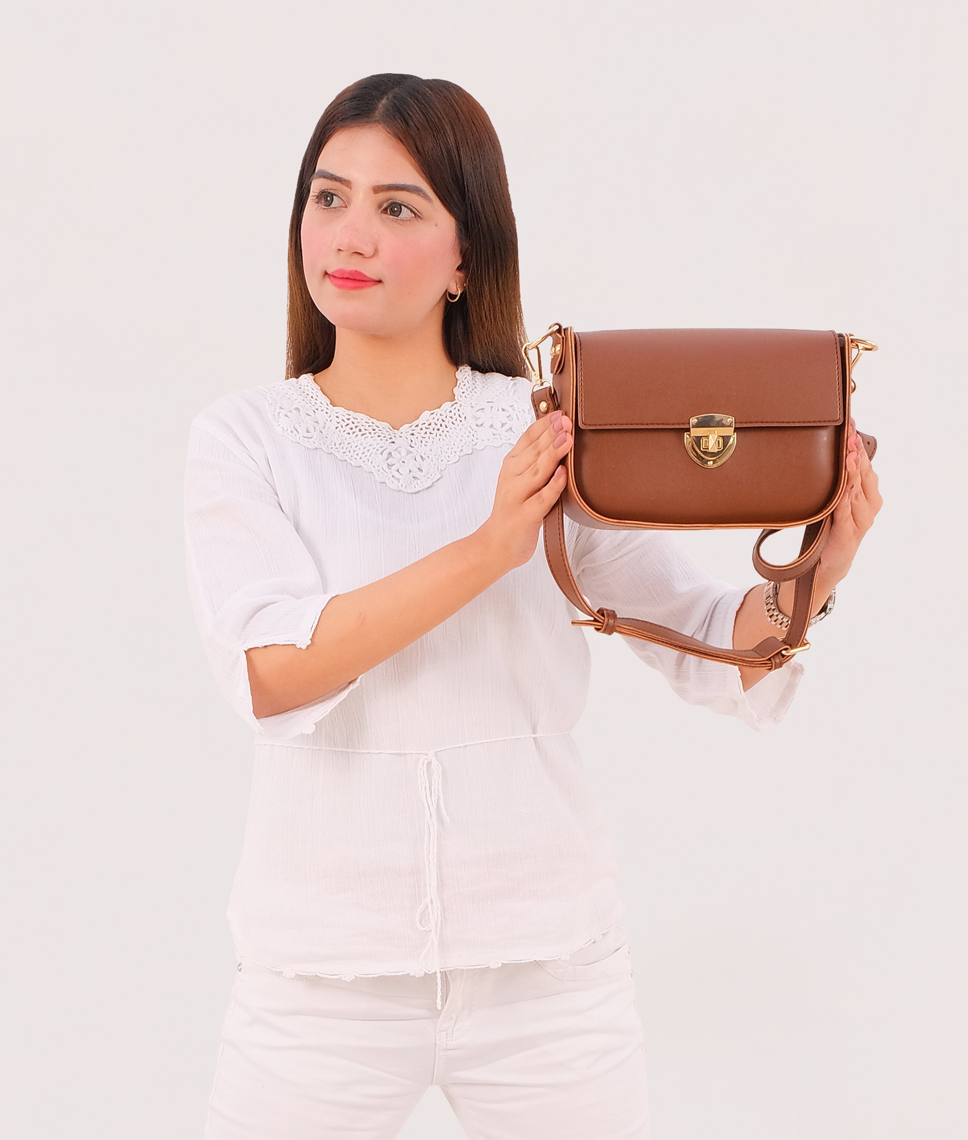 RTW Creation - Brown saddle bag with twist lock