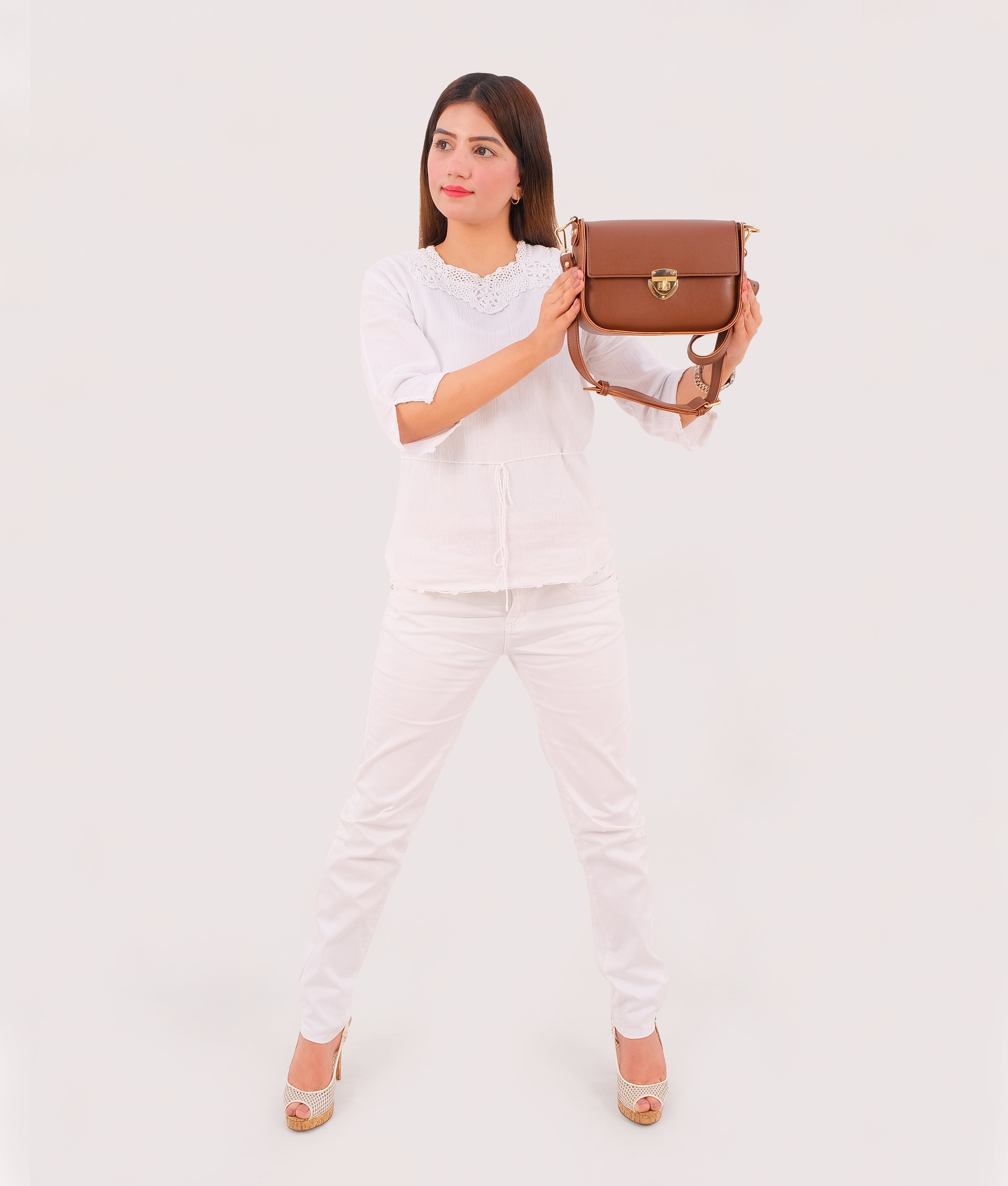 RTW Creation - Brown saddle bag with twist lock