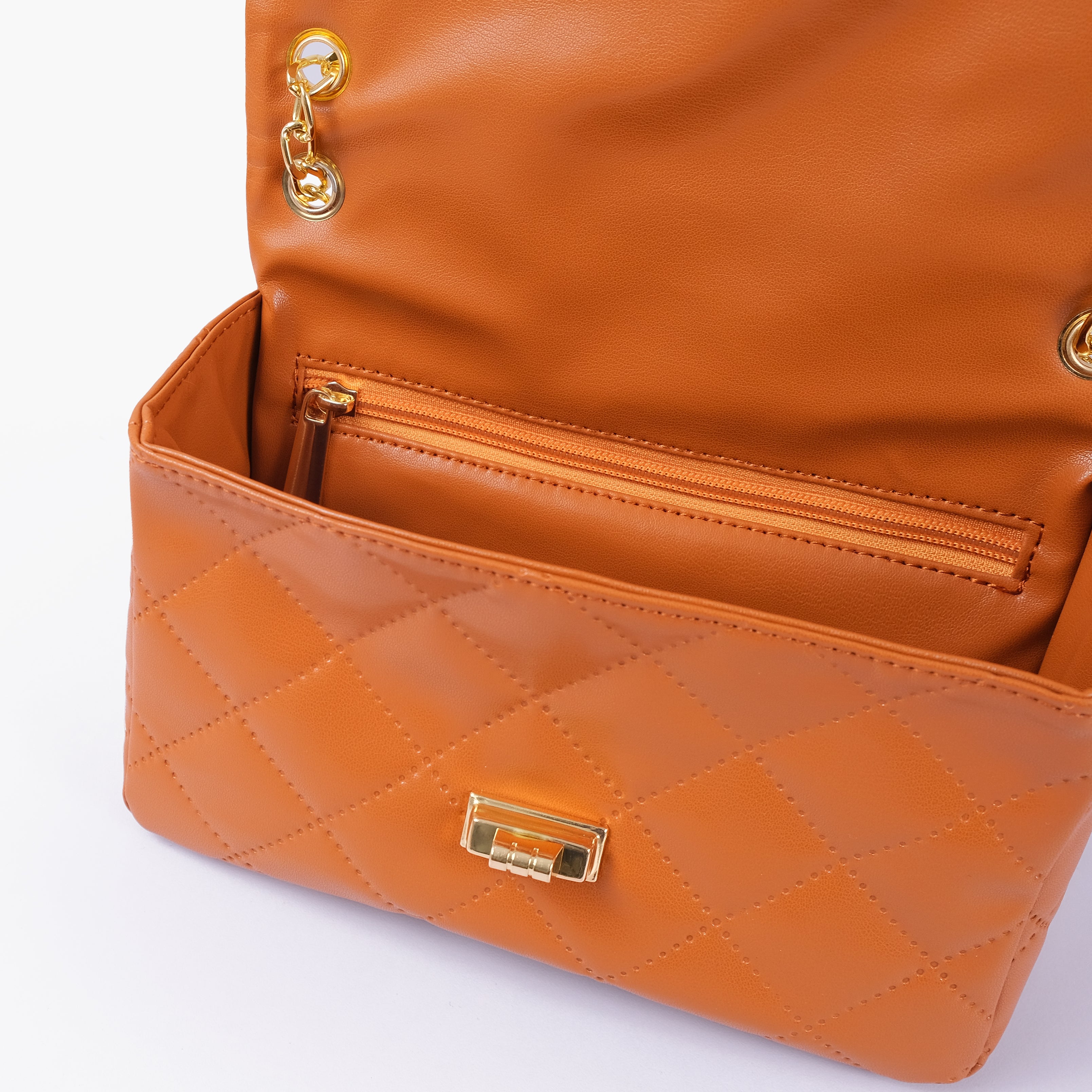 RTW Creation - Mustard quilted mini bag with chain