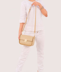 RTW Creation - Off-white saddle bag with twist lock