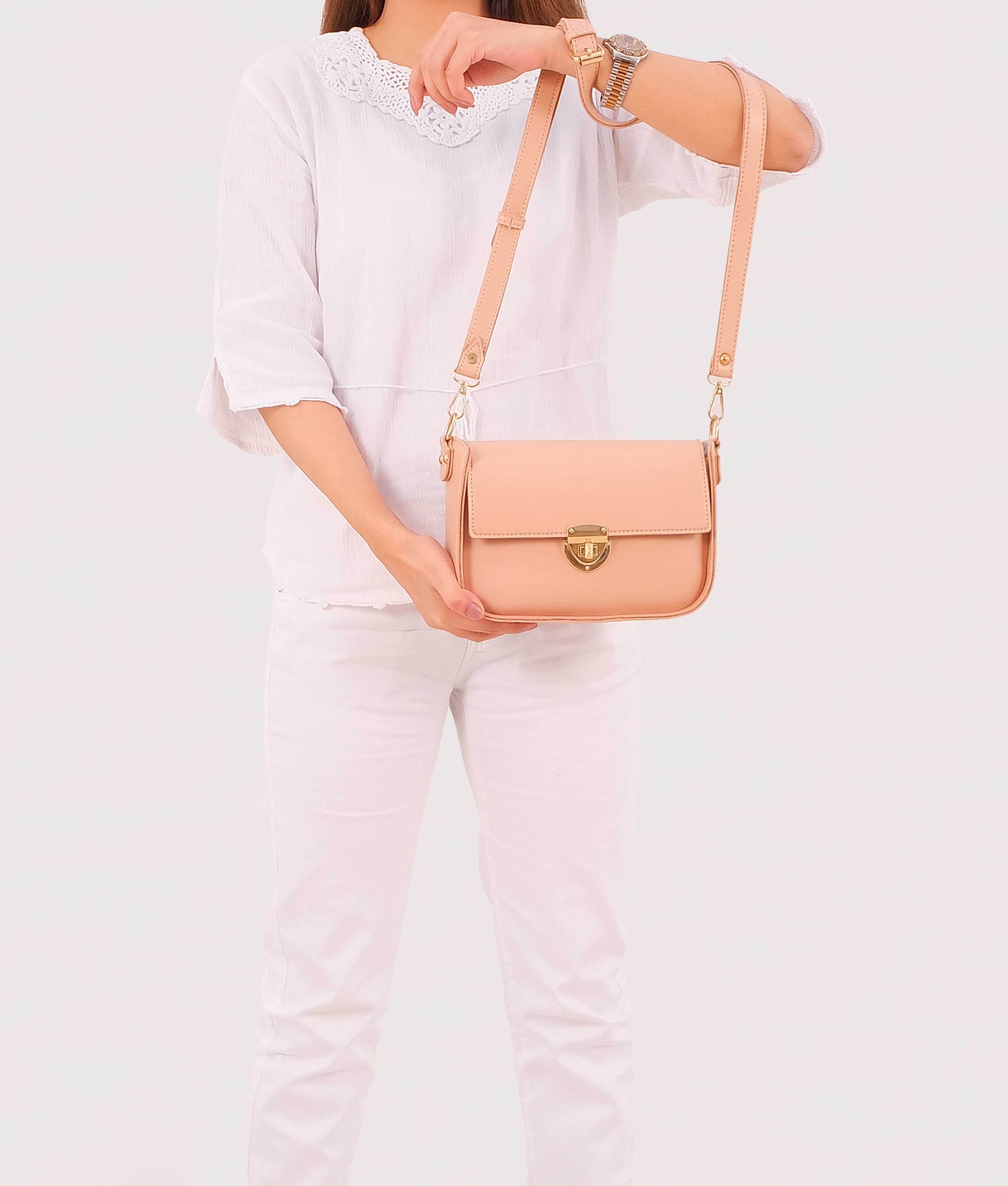 RTW Creation - Peach saddle bag with twist lock