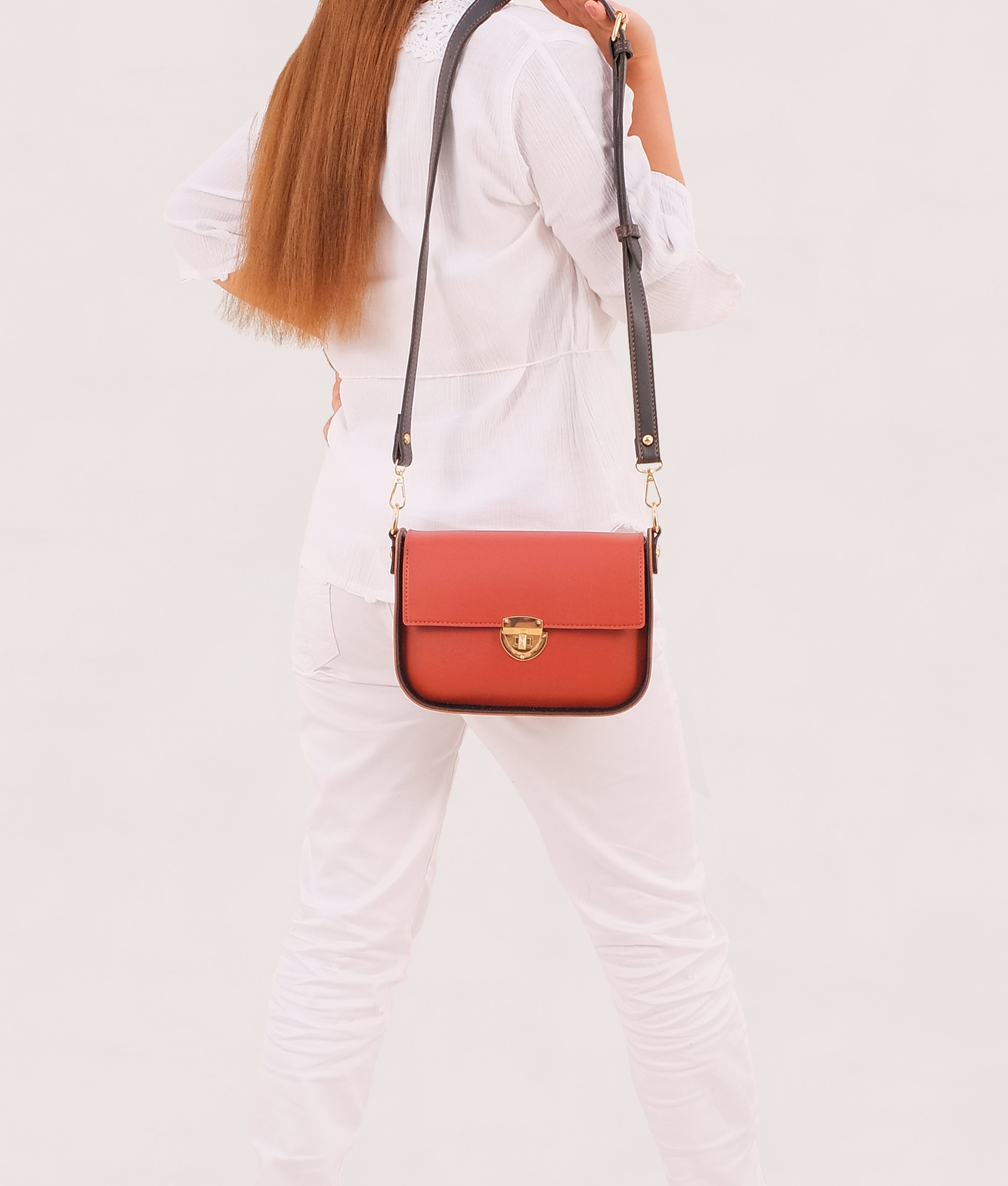 RTW Creation - Rust saddle bag with twist lock